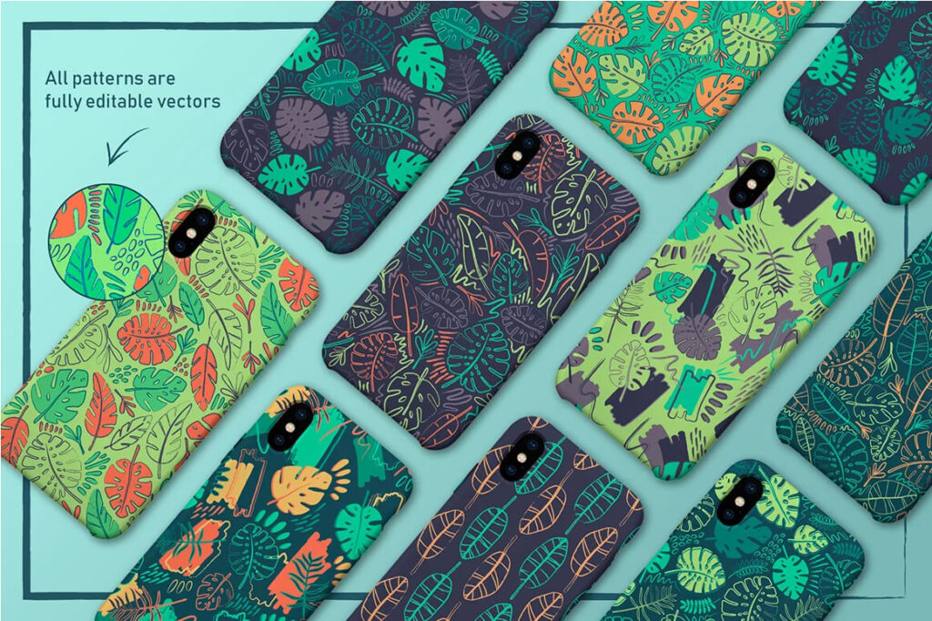 Several cell phones with covers printed with tropical foliage patterns.